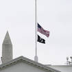 The American flag flies at half-mast at the White House