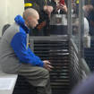 Russian sergeant Vadim Shishimarin, 21, is seen behind glass during a court hearing in Kyiv, Ukraine, on Friday May 13 2022