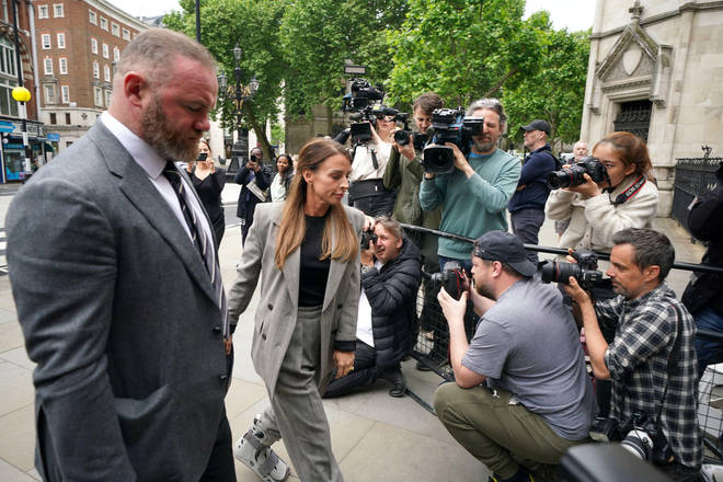 Coleen and Wayne Rooney arrive at the Royal Courts of Justice.