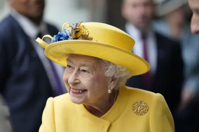 The Queen beamed as she attended the event marking the line's completion today