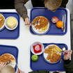 Schools may have to reduce portion sizes for children's meals due to ratcheting costs, the boss of one of the UK's biggest food wholesalers has warned.