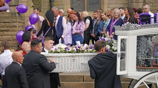 The coffin for Katie Kenyon is carried into St Leonard's Church