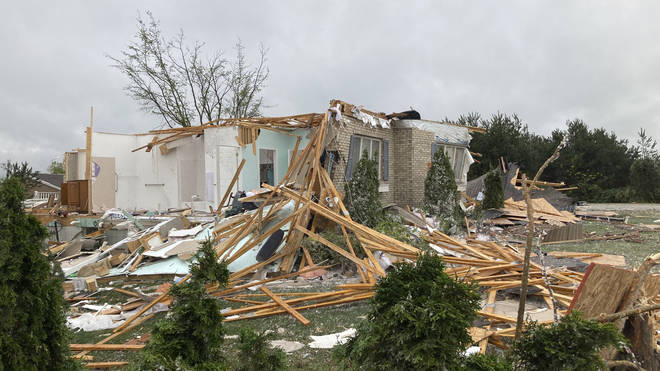 Damage is seen at a home after a tornado came through the area in Gaylord, Michigan