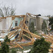 Damage is seen at a home after a tornado came through the area in Gaylord, Michigan