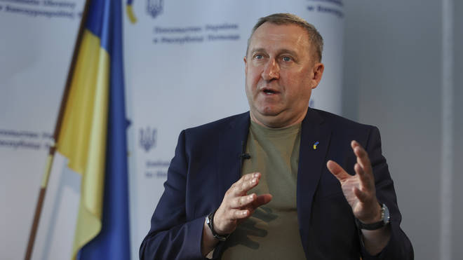 Ukrainian ambassador to Poland Andrii Deshchytsia speaks during an interview with the Associated Press in Warsaw, Poland