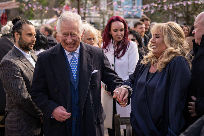 The Prince of Wales with Letitia Dean during a visit to the set of EastEnders