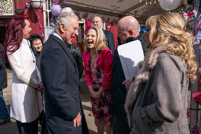 The Prince of Wales with Kellie Bright, Steve McFadden and Letitia Dean during a visit to the set of Eastenders