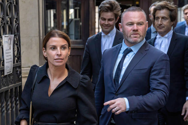 Coleen Rooney and husband Wayne Rooney leaving the High Court.