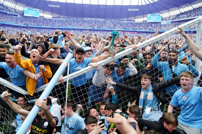 Manchester City fans stormed the pitch after the dramatic win.