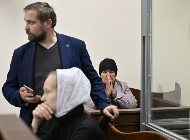 Kateryna Shelipova, the wife of Mr Shelikov, reacts during Shishimarin's trial