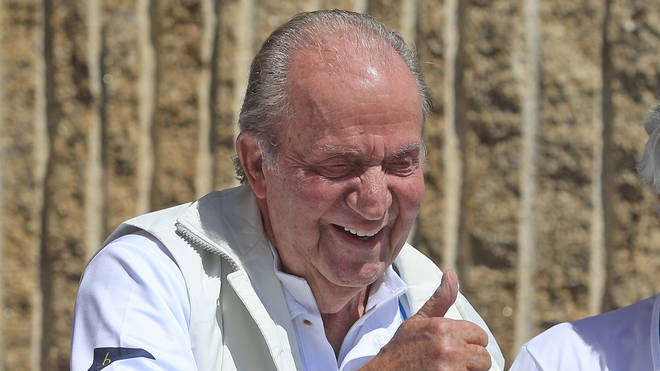 Spain’s former king Juan Carlos gives the thumbs up before a reception at a nautical club prior to a yachting event in Sanxenxo, north-west Spain
