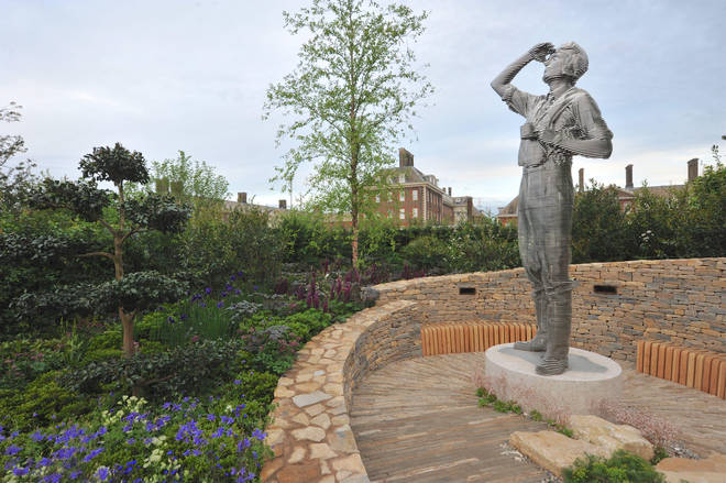 The RAF Benevolent Fund Garden: A statue of a young World War 2 pilot watches over the leafy display erected in the ground of the Royal Hospital Chelsea, in Chelsea.