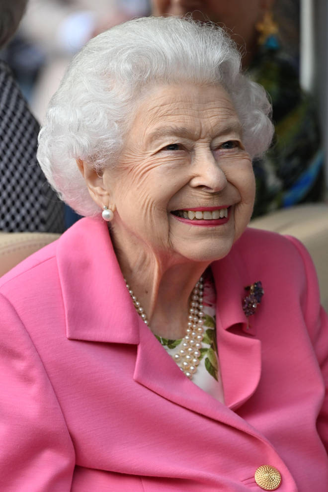 The Queen was pictured smiling at the Chelsea Flower Show.