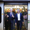 Mayor of London Saiq Khan (right) and Andy Byford, Commissioner at Transport for London (Tfl) disembark the first Elizabeth line train (Kirsty O'Connor/PA)