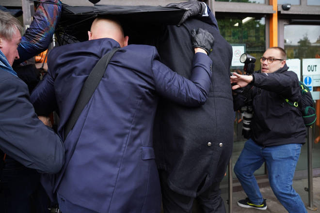 Several security guards protected Kurt Zouma as he made his way into the court on Tuesday