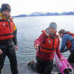 Oceanographers Andrew McDonnell, left, and Claudine Hauri, middle, are pictured with engineer Joran Kemme after an underwater glider is pulled aboard the University of Alaska Fairbanks research vessel Nanuq from the Gulf of Alaska