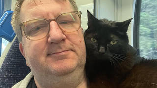 Ian Fenn and his assistance cat Chloe