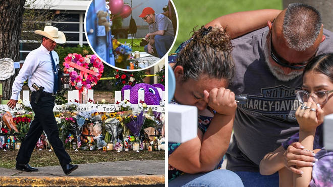 Grieving relatives pay tribute at a memorial for the victims