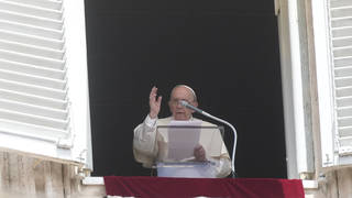 Pope Francis delivers a prayer from a window overlooking St Peter's Square