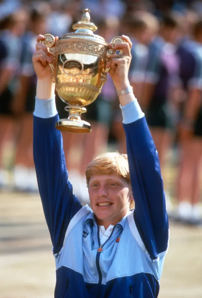 Boris Becker lifts Wimbledon trophy