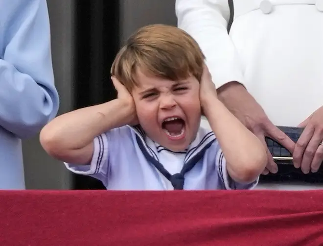 Prince Louis stole the show today as he covered his ears while watching the Platinum Jubilee flypast with the Queen from Buckingham Palace balcony.