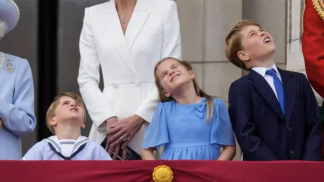 His older siblings Prince George, aged eight, and seven-year-old Princess Charlotte were also animated and could be heard chatting on the balcony.