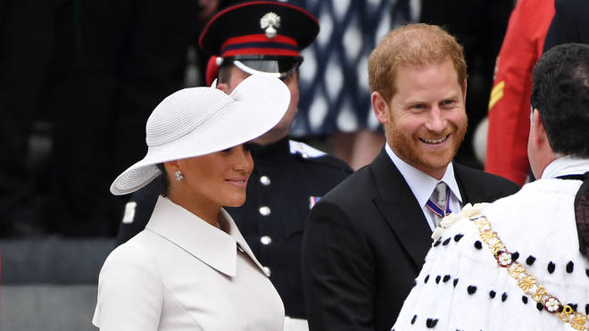 Harry and Meghan were all smiles ahead of the service