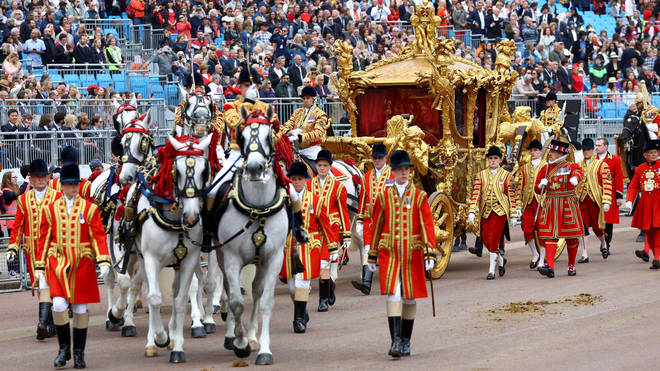 The eight-horse-drawn making its way through central London.