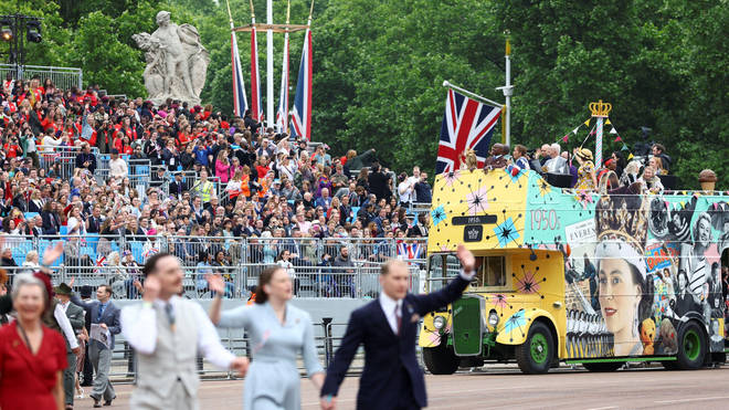 The pageant making its way past Buckingham Palace.