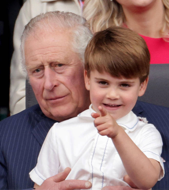 At one point the young prince sat on his grandfather Prince Charles' lap
