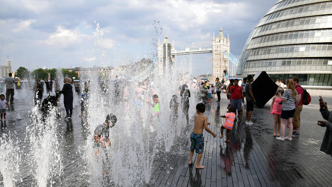 Children playing in water in London during heatwave