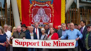 Former miners and Labour MSPs outside Holyrood