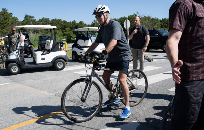 President Biden fell off his bike when cycling over to speak to some bystanders