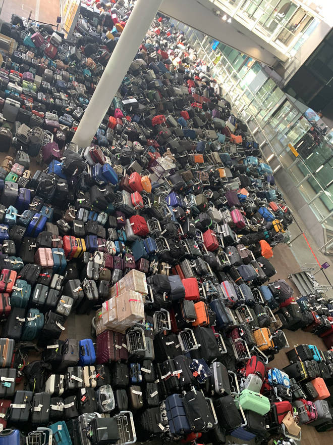 The "enormous luggage carpet" was pictured at Heathrow Airport Terminal 2