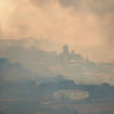 Smoke rises over San Martin de Unx in northern Spain