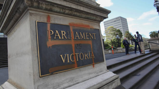 A Nazi swastika is seen graffitied on the front of the Victorian State Parliament, In Melbourne, Australia, in 2012