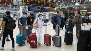 Passengers at Paddington station, west London