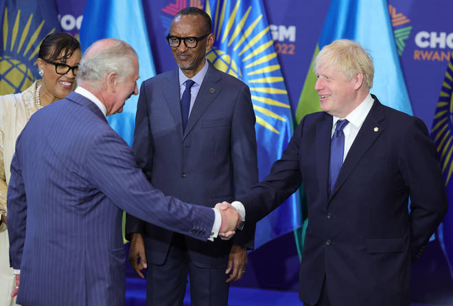 Prince Charles and Boris Johnson were all smiles at a meeting in Rwanda.