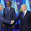 Prince Charles and Boris Johnson were all smiles at a meeting in Rwanda.