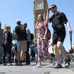 Tourists outside the Houses of Parliament in London