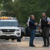 Chicago police at the scene where a five-month-old girl was shot and killed in the South Shore neighbourhood of Chicago