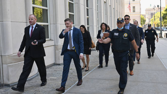 The prosecution team arrives for the sentencing hearing of R. Kelly at Brooklyn Federal Court in New York