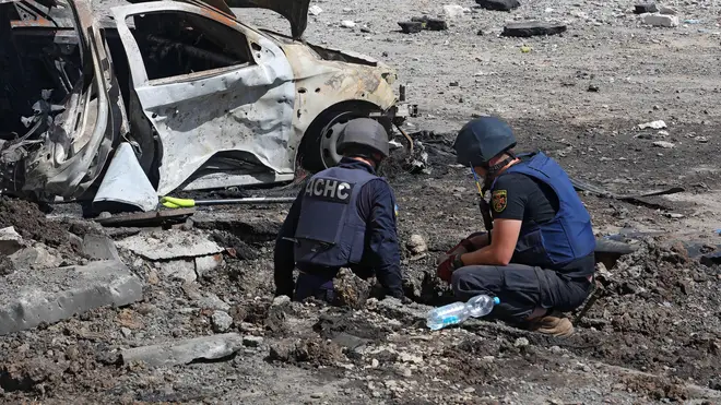 Emergency workers in Kharkiv, Ukraine, following a rocket attack (file image)