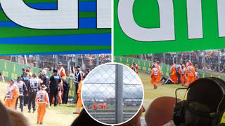 Eco protesters stormed the track and were dragged out the way of oncoming cars