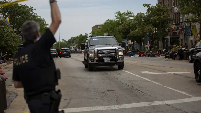 Lake County major crime taskforce spokesman Christopher Covelli said at a news conference that the gunman apparently opened fire on parade-goers from a rooftop using a rifle that was recovered at the scene.  	