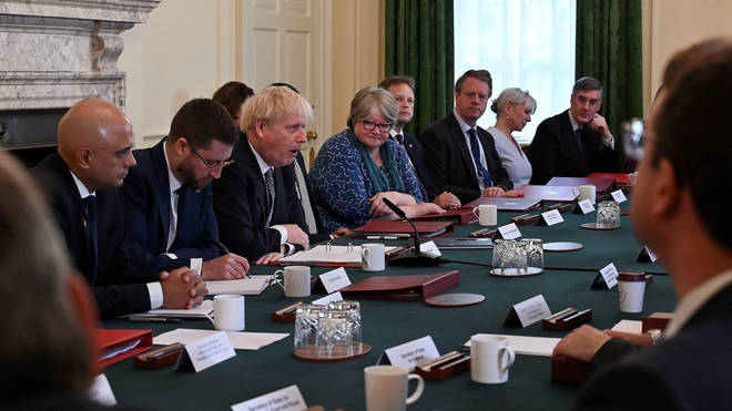 Glum faces around the Cabinet table
