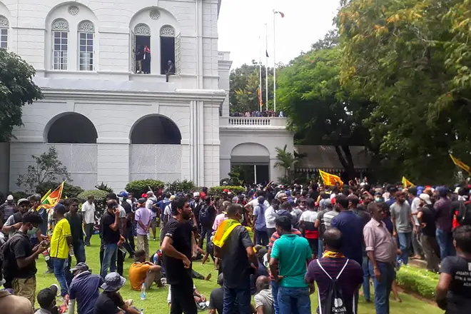 Protesters demanding the resignation of Sri Lanka's President Gotabaya Rajapaksa gather inside the compound of Sri Lanka's Presidential Palace in Colombo