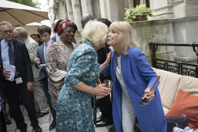 Camilla, Duchess of Cornwall greets a guest as the Duchess celebrates her 75th birthday.