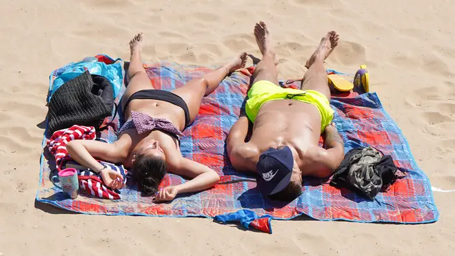 Sun seekers soak up some rays this week but there are warnings for people to stay out of the sun in the middle of the day