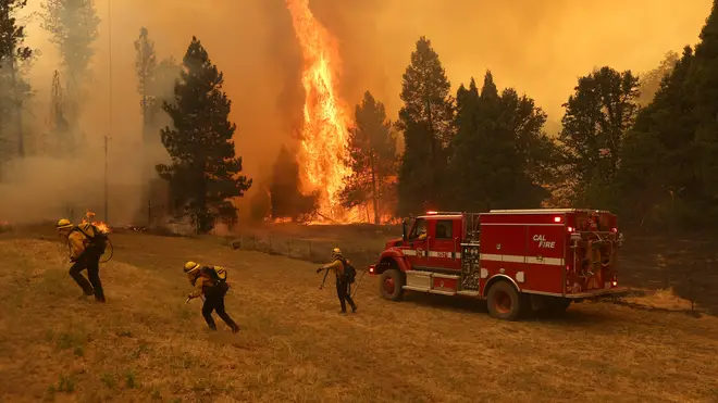 Dramatic pictures show huge flames rise from California's forests